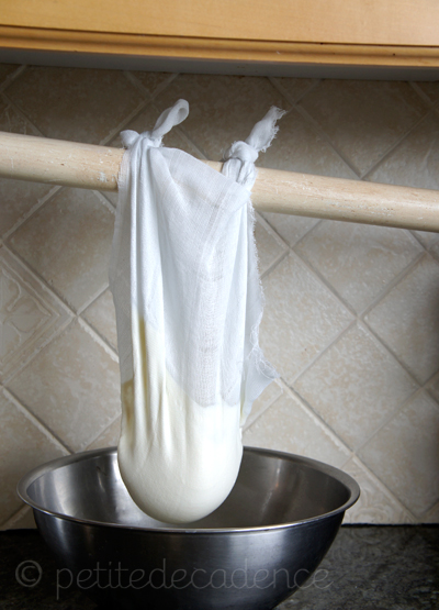 Hang the cheese to drain whey